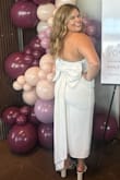 This dress is exactly what I was dreaming of wearing for my bridal shower, and I'm so glad I found it! The bow is the most perfect accessory, and I got so many compliments wearing this! - Hailey B.