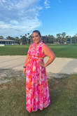 I purchased this dress to wear to our annual work party. The theme was fancy luau, and this dress was perfect! Light and airy. Love the adjustable open back. Vibrant, beautiful colors and design. - Stephanie G.