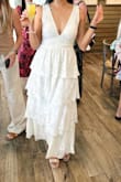 The fit is perfect,  but did show some cleavage as it has a low-cut front.  The lace was great quality. I received many compliments. - Siobhan O.