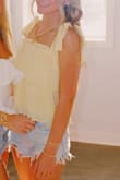 Wore this top to a concert recently and it was perfect! I'm usually a XS or small more on the xs side, and it fit perfect! Definitely recommend! - Piper C.