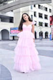 It's so pretty and flattering but it was long for me so I wore 5 inch platform heels underneath. - Richael M.