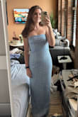 This dress was on sale for 65 bucks, but looks like a million! It's a little loose but that may be because I have a smaller chest. The slit makes it breathable. Gorgeous color, the beading is gorgeous, and just a special dress. - Abbey G.