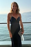 Loved this dress so much! It was flowy and the pleats made it so you don't need shapewear. Beautiful deep blue color.  It also travels extremely well. My hanger broke in the garmet bag and it was a crumpled ball at the bottom when we got off the flight but it didn't wrinkle at all. - Christina O.