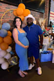 I took a chance that this dress would fit my 32 week baby bump for our shower and it did! I was very comfortable and I got a ton of compliments. I also did a lot of dancing and it stayed in place. I would also wear this postpartum too. Highly recommend! - Becca A.