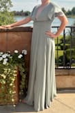 The color is cute and love how it hides my belly. A little tight in the rib cage but still fit!! Longish bottom but if you wear heels will be ok. Highly recommend. - Mackenzie E.