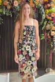 This dress was so fun to wear! All the fun 3D flowers became a bit of a conversation piece in the best way with other guests at the wedding. The lining in the dress made it comfortable, and the way the back and straps tied made the fit extra perfect. - Emily K.