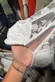 I first ordered the dress in size M, and when I tried it on, it was too big (even though I normally always wear size M). So I requested an exchange and ordered it in size S, but this one was also too big and, on top of that, it arrived with a defect: the mesh in the center of the neckline is torn. - Estefania E.
