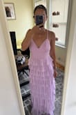 The dress is beautiful, and I love the color. I took the quiz to determine my size, and it recommended xs, so that's what I bought. It fit except for the length - it's way too long, even with heels! - Julianna S.
