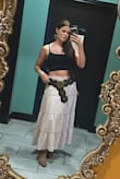 I'm a full time musician and performer so I'm constantly looking for accessories to enhance my outfits. I've had my eye on this belt for quite sometime and it's always sold out. It finally got restocked, and I bought it asap. I've worn it multiple times since purchasing! It's great with skirts, dresses, shorts, or pants. I really like that it's black and bronze because it matches my brown boots and my black ones! It is a little long on me, but I have no complaints. - Lyda P.