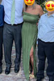 I have never gotten so many compliments on a dress in all my life. The fit, the color, the quality... everything exceeded my expectations. Dress has a slight stretch and runs slightly on the bigger side IMO. I ordered a small even though I'm a true medium, it was perfect. - Sarah H.