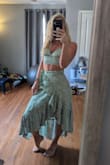 Probably my favorite purchase from LULU'S! Material is so lightweight and flattering! The top was a little large in the cup area so I will definitely be wearing my sticky cakes next year, but I don't think sizing down would have mattered much! - Brittney B.