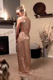 The color is absolutely stunning, its very well made, its comfy, I can definitely wear it with or without a bra. I'm shorter so its a little long on me (which is to be expected) but I think with heels it'll be fine. It does tend to shed little sequins a bit straight out of the bag. (No bra on in the pic) - Morgan A.