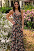 Absolutely love this dress and fits in all the right places!! I originally thought about ordering a small but thankfully did not because a medium fit perfectly. It is particularly tight in the waist, so if you are in between, go a size up. Love the adjustable straps. A perfect length for a tall woman too but if your 5'9" or taller, heels might not work due to length. The slit is sexy too but if need to tone it down, I followed what another reviewer said and safety pinned it to make it appropriate. Overall, love this dress for the price and can't wait to wear it to a friends wedding. - Kathleen L.