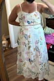 It's really cute!  However, the top has a weird fit. They made the cups so small. I am a 36C, and I am stuffing myself into the top. The skirt fits great. I wish they would sell this set as separates and let you order in different sizes.  The top and the skirt has some elastic on the back so both have some give. I have long legs and a short torso. The dress is lightweight and really pretty. - Whitney P.