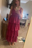 I wore this for my senior pictures, and it was a show stopper. I will definitely rewear it for many events in the future. I'm almost 5'11 and the dress went all the way down. Definitely tall girl approved. - Alaina B.