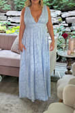 I had to get this dress hemmed and the shoulders adjusted. It is very long and large in the bust. The dress is beautiful, and I did get a lot of compliments it was just a lot to get done. - Amanda J.