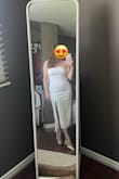 Bought this dress for an elopement. It fits perfectly and is made out of a heavy and thick material that add elegance and comfort to the piece. I LOVE the bow in the back. Well worth the price. - Grace S.
