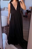 As a petite girlie, I was SWALLOWED by this dress. The fabric is ok (expected at this $99 price point) and looks a bit cheap, but there is SO MUCH of it! The dress overtook my body. My boyfriend's comments were "you look like a character from a scary movie". Returned. - Angela L.