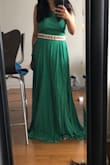 The fabric is beautiful and the back is hot but was too revealing for me and not good for people with a bigger chest. - Melissa