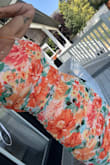 Super fun dress. Fit great but the colors are not as pastel as the online photo shows. The orange is quite bright and saturated. - Sadey L.