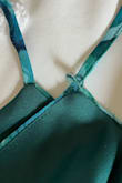 The Good: The colors are beautiful and exactly as pictured. The fit was very flattering. However, the bodice was very snug, and the material has no give to it. So you may need to size up.

The Bad:  The construction is poor.  The straps are very thin, and one of them wasn't fully attached to the liner and was already fraying. (See pics) I didn't notice it until two days before the wedding, so I had no time to return it.  I sewed it, but the material is still fraying. I don't think it will last long :( - Lyne A.
