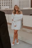 This dress is beautiful and a nice thick material. Highly recommend! The sleeves are a little long, but could be altered if someone wanted. - Katie P.