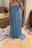 The fit of the dress was great, the top was very beautiful and structured. Color was beautiful, as pictured. If you purchase this dress, plan to have it hemmed. I am 5'7 and there was fabric pooling on the ground. Ultimately returned it because I did not want to pay to have it hemmed. - Makenzie G.