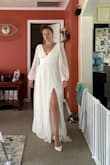 Sat here all over the internet looking for the perfect wedding dress. Wanted something affordable, but good quality. I bought this dress, and the shipping was quick! It fits so wonderfully, and I'm in love with this dress. I got a Medium, but I'm a bit wide, so there are some restrictions for me in the ribs. - Monica G.