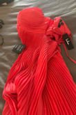 Dress doesn't fit right, and it's too long, so I'd like to return it. - Lisa S.