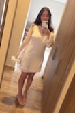 The white dress that goes underneath is a little bit loose, but since the one on top goes loose on purpose, you can't really tell, so it didn't bother me at all. Didn't feel the need to change sizes. The sequins quality is good and overall looks like a high quality dress. - Andrea C.
