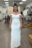 I'm excited to wear this to my civil ceremony on the waterfront! I had to have it hemmed, but otherwise, it fits beautifully. I even had the tailor bustle the back. Shapewear is helpful for clean lines, but it's not a must. I'm happy with my purchase! - Terry V.