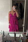 The dress is much more purple in person. I was really wanting pink. I am always between a Large and XL and should have sized down to a large. - Jenny C.
