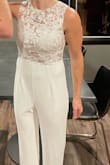 Wore this jumpsuit for my wedding rehearsal - I am not tall, so the length was perfect and didn't need any alterations. Looked very classy and expensive. - Chandler K.