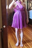 The color is more purple than the photo, but I love it. Silky and fancy, perfect for a disco themed wedding. The neck is a little tighter than I'd like; however, it is so cute I'm wearing it. I thought the length may be too short, but it is mid-to-lower thigh. - Michelle R.