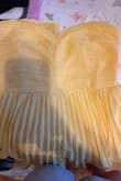 The dress is perfect. It was a little small around the chest area, and extra it for a bigger size. Just because it zips doesn't mean it fits - Luz L.