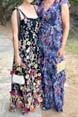So cute, and I got several compliments! At 5'3", I wore it at floor length (wearing ~3.75" heels) for an outdoor black tie optional wedding. I'm impressed by the quality of the 3D flowers. They were thick enough to look well-made but not so thick they were too heavy to stand up on their own. Any wrinkles steamed out easily, and whatever wrinkles remained on the dress itself were obscured by the dark fabric. The long tulle straps are adorable and can be retied at whatever position and length you want.

Take a few moments before you wear it to trim all the extra threads from the embroidery, and be careful not to put too much weight on the dress while hanging. Even while using the hanging support straps, one of the tulle straps started to tear from the dress after only having hung up for a night. I reinforced it with some black embroidery thread and kept the same needle and thread with me at my event, just in case, but luckily didn't have any more incidents even after a full night of dancing. - Rebecca C.