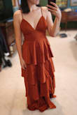 I LOVED this rust/pumpkin color, and the cut of this dress made me feel fabulous. The fabric was high quality, and even though there's a sheen to it, the dress is very flattering with no shapewear needed to hide a belly button. I'm not used to lower cuts, but I didn't mind it at all on this dress. I felt covered, secured, and sexy. It is plenty long! Unfortunately, I couldn't keep it as I was in a rush and didn't have time to shorten it (At 5'3", I would've needed several inches shortened to even wear it at floor length with 4" heels.) But this could be a good option for taller girls. - Rebecca C.