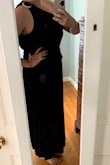 This dress is gorgeous! It flows nicely, it's soft, doesn't cling. You truly can't go wrong with this it's nice and loose in the waist so is comfortable. Would be great for someone who is pregnant or postpartum also given the loose fit. - Hailey P.