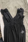 The dress that I received was different than the one pictured. It doesn't have the same deep v detail going through the first ribbon in the neckline. It's a 2X , but if the plus sized dresses are different, it should show that. Unfortunately, the wedding is this weekend and I don't have any other options so I have to wear it and I won't be able to return it. - Erika J.