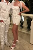 Wore this for my wedding Welcome Party. It's a very cute dress! The bow tie sleeves are unique, and just know that it's really tough to get the sleeves to look flat and neat while staying tied. If you're ok with an asymmetrical look, you are solid! - Elizabeth B.