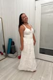 I bought this for my engagement photos on a beach. However, the fabric is very thick for what I'm looking for. It's a nice dress, wouldn't use this at the beach though. - Raynell R.