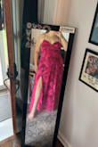 This dress is so fun and pretty. It fits well without shape wear. I'm 5'6 and it just barely touches the ground without shoes on, which is nice. I don't need it altered at all - Paige K.