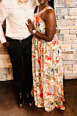 I absolutely love this dress. I received so many compliments that it was overwhelmingly flattering. The dress is perfect for those with curves and on the taller side. I cannot wear heels taller than 2.25 inches, so it was a tad bit long for my height. I had to keep holding up my dress as I was walking on it. That's the only drawback, but still 5 star worthy. - Pamela I.