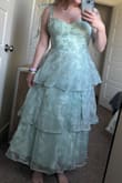I ordered 5 different dresses (all in green tones) for a wedding that I will be a guest at in September. THIS was THE ONE! I have gained some weight and feel a little insecure about my tummy, and this does a really good job of shaping my body and making me feel cute! It is longer on me than pictured, but it still looks great. The only important thing to note is that it definitely is more of a sage-green and not as minty as it looks online. That's perfect for me, but might not be for everyone. - Megan B.
