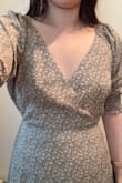 I would not recommend this to anyone under 60. The color and material are very aging in person (much less of a neutral brown, more like a dull green with prominent white flowers). Fit-wise, this dress made me look incredibly fat and wide, even though I have a very slim torso and waist (115 pounds, 5'5", 24 inch waist), and the dress went past my ankles. If you are my size, you should absolutely size down because the extra fabric will make you look so much bigger than you are. It highlights the stomach, so maybe a decent maternity option. - Irene Y.