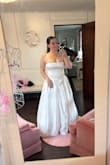 I had it hemmed and had lost about 10lbs to make it work. So worth it, especially with the affordable price tag!! Can't wait to wear it next month officially! - Ashley G.