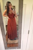 I personally thought this dress was prettier in person than in the stock photos; it's slightly darker, but I prefer that. The print is pretty and it's long, I'm 5'9 and it touched the tops of my toes even with heels on, that doesn't happen very often. I ended up returning only because the cowl neck sits funny, it doesn't drape like it's supposed to and will essentially just flap open and let everybody see straight down your top. This could be fixed with some double-sided body tape or maybe those who are larger chested won't have to worry about it. For me the cost wasn't worth the hassle. - Nichole D.