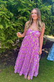 I wore this to a summer wedding with a formal dress code, and it was perfect! The colors are gorgeous, it's so flowy and comfortable, and I got so many compliments on it throughout the night. I didn't have any issue with it staying up, it felt very secure, and I was dancing a lot at the wedding. I can't wait to wear it again! - Lauren K.