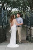 I purchased this dress for my vow renewal in Charleston and absolutely loved it! I did need alterations (which were a bit costly due to the beautiful, intricate beaded design), but since the price point on the dress was so great, it all worked out. I had it taken in on the sides, the straps shortened, and hemmed at the bottom, worn with a 3 in. heel (maybe could've done an XS but didn't try). I LOVE the open back and v-neck, it made me feel sexy without being trashy. The beading did make the dress quite heavy, but I wore it on a 90° day and survived. I loved how it showed off my curves perfectly. Couldn't be happier with this purchase! - Jill D.