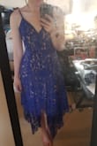 I have this in both the blue and the white and honestly can't decide which one I like better. This dress is exquisite. Obsessed - Jackie A.